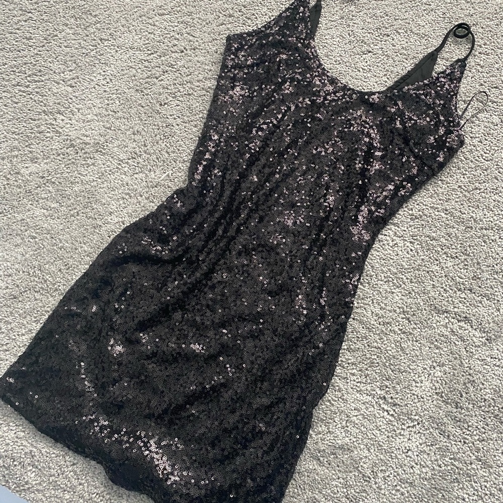 Black sequined fitted mini dress